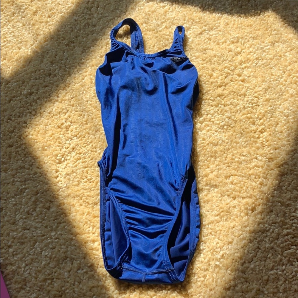 Fast race skin on piece for swimmers